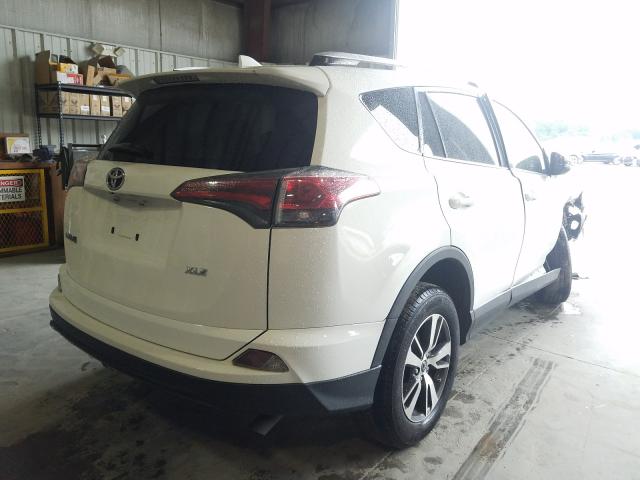 Photo 3 VIN: 1TMWFREV6GJ060533 - TOYOTA RAV4 XLE 