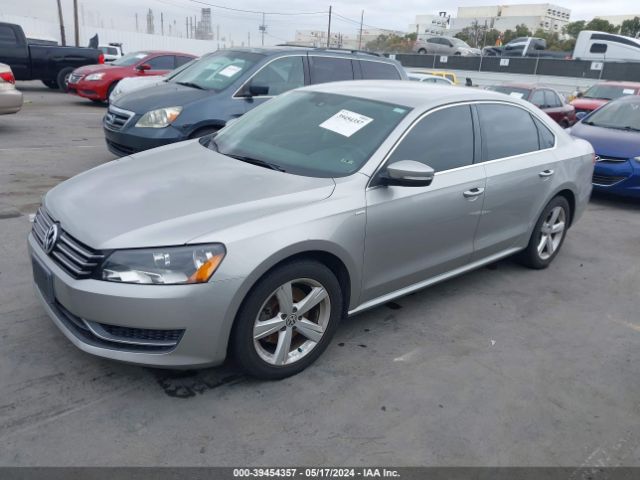 Photo 1 VIN: 1VWAT7A39EC053960 - VOLKSWAGEN PASSAT 