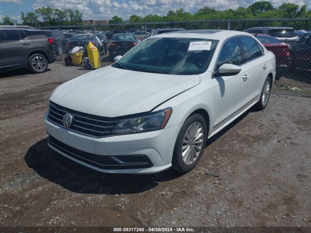 Photo 1 VIN: 1VWBT7A3XGC031957 - VOLKSWAGEN PASSAT 