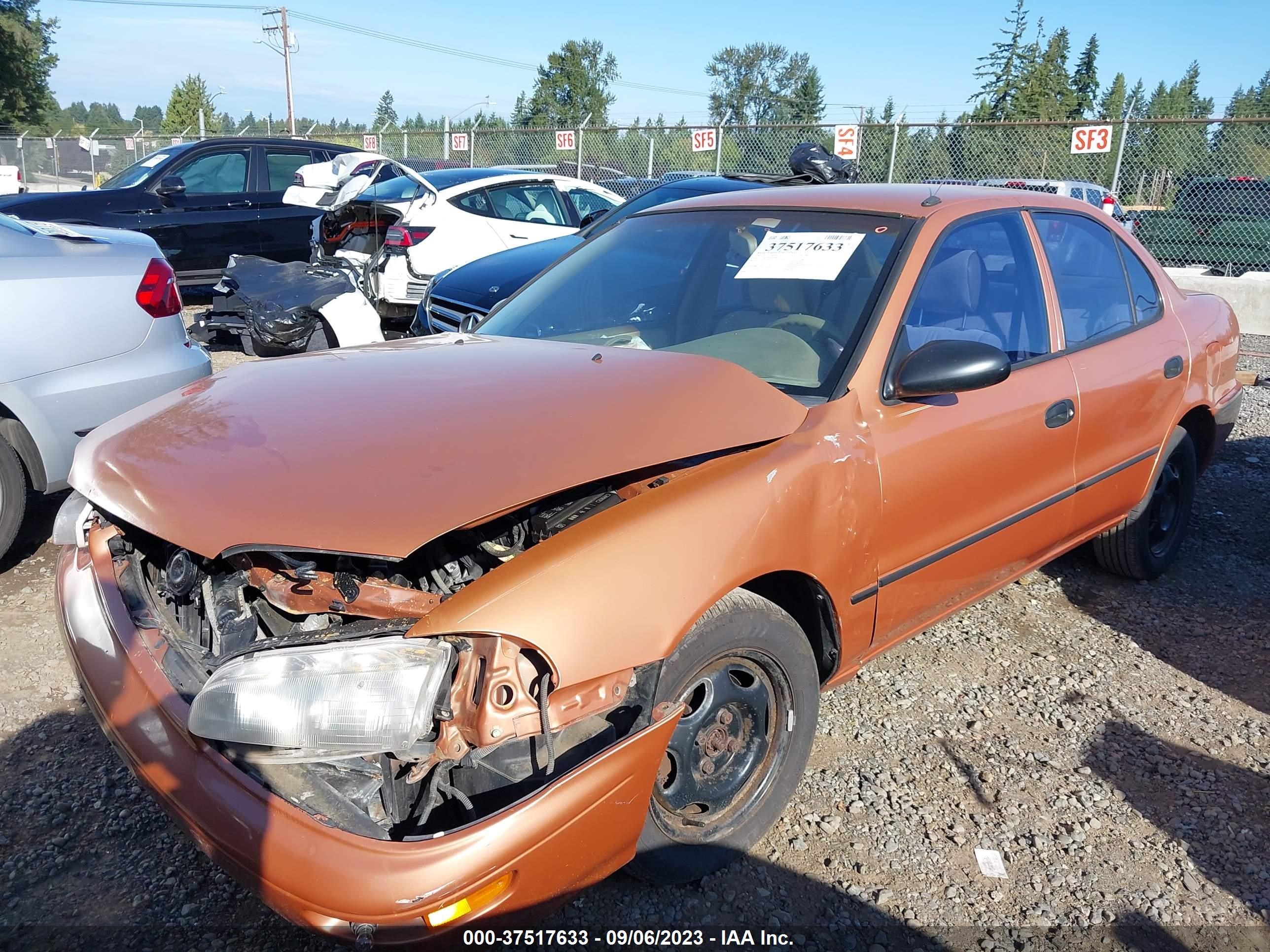 Photo 1 VIN: 1Y1SK5268VZ418984 - GEO PRIZM 