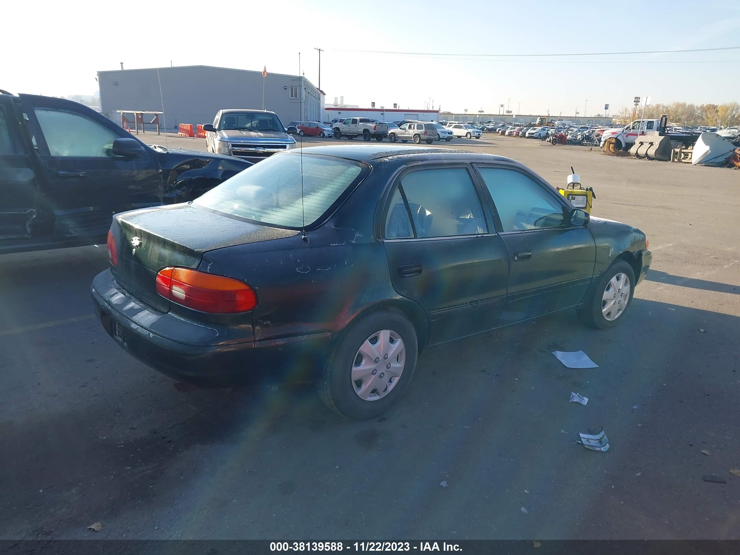 Photo 3 VIN: 1Y1SK5281YZ413096 - CHEVROLET PRIZM 