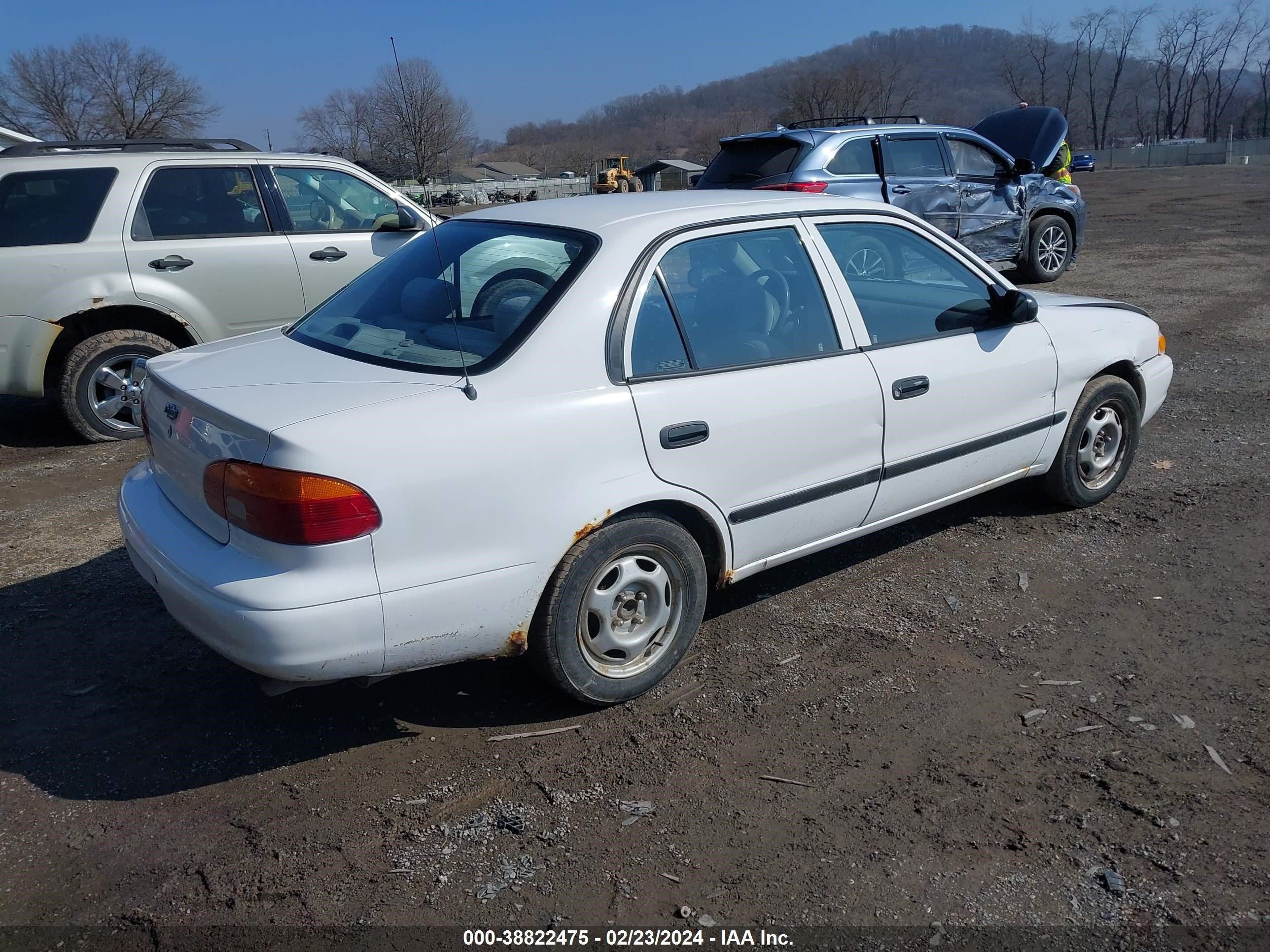 Photo 3 VIN: 1Y1SK5282YZ425001 - CHEVROLET PRIZM 