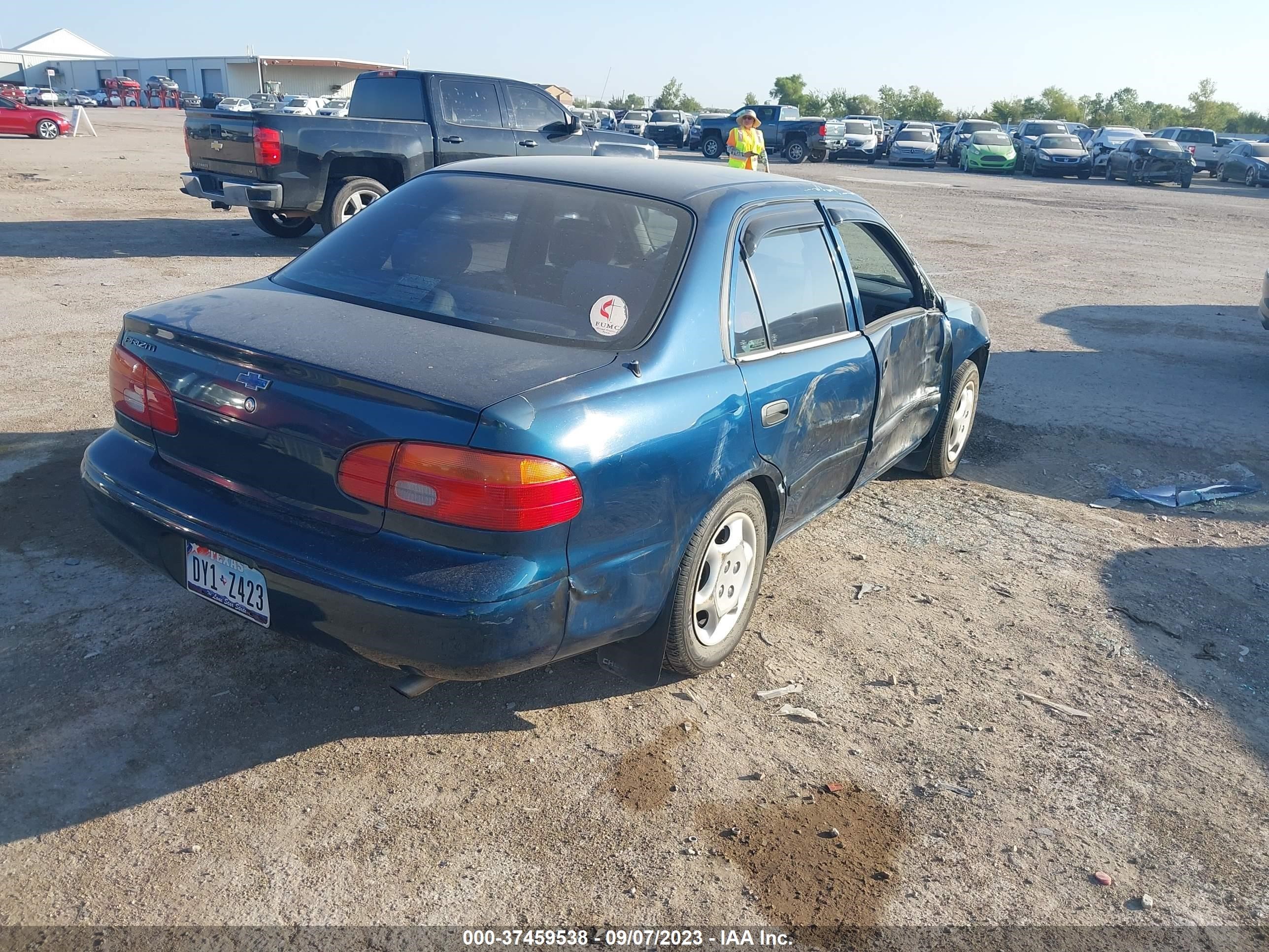 Photo 3 VIN: 1Y1SK5287YZ413197 - CHEVROLET PRIZM 