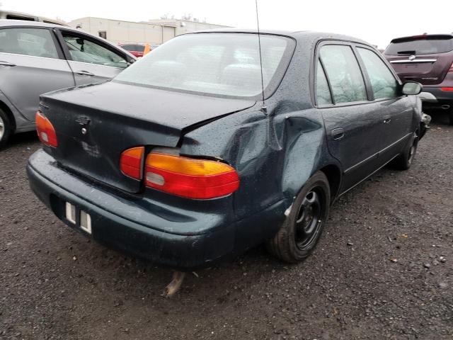 Photo 2 VIN: 1Y1SK528XXZ440165 - CHEVROLET GEO PRIZM 