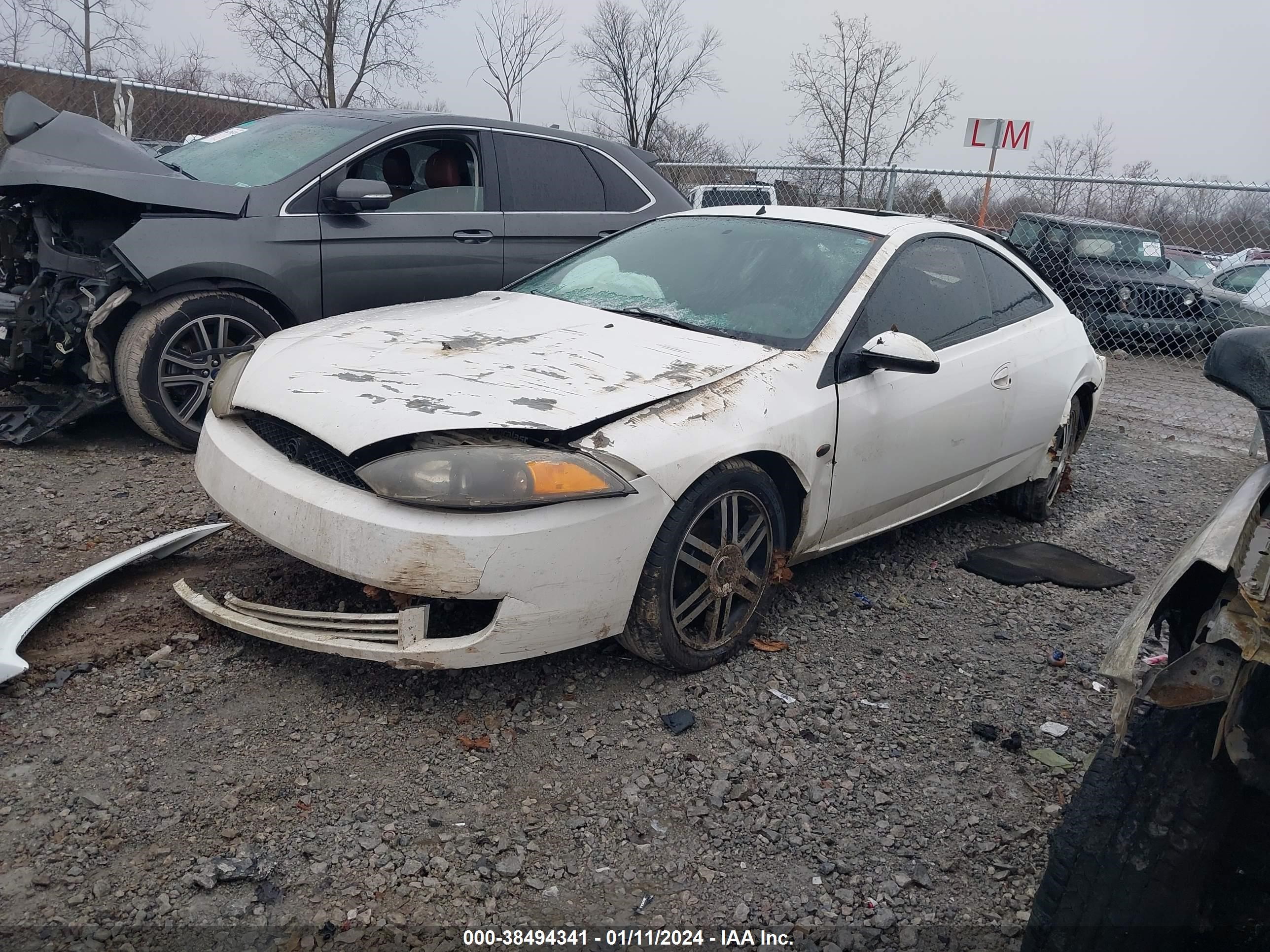 Photo 1 VIN: 1ZWFT61LX15610112 - MERCURY COUGAR 