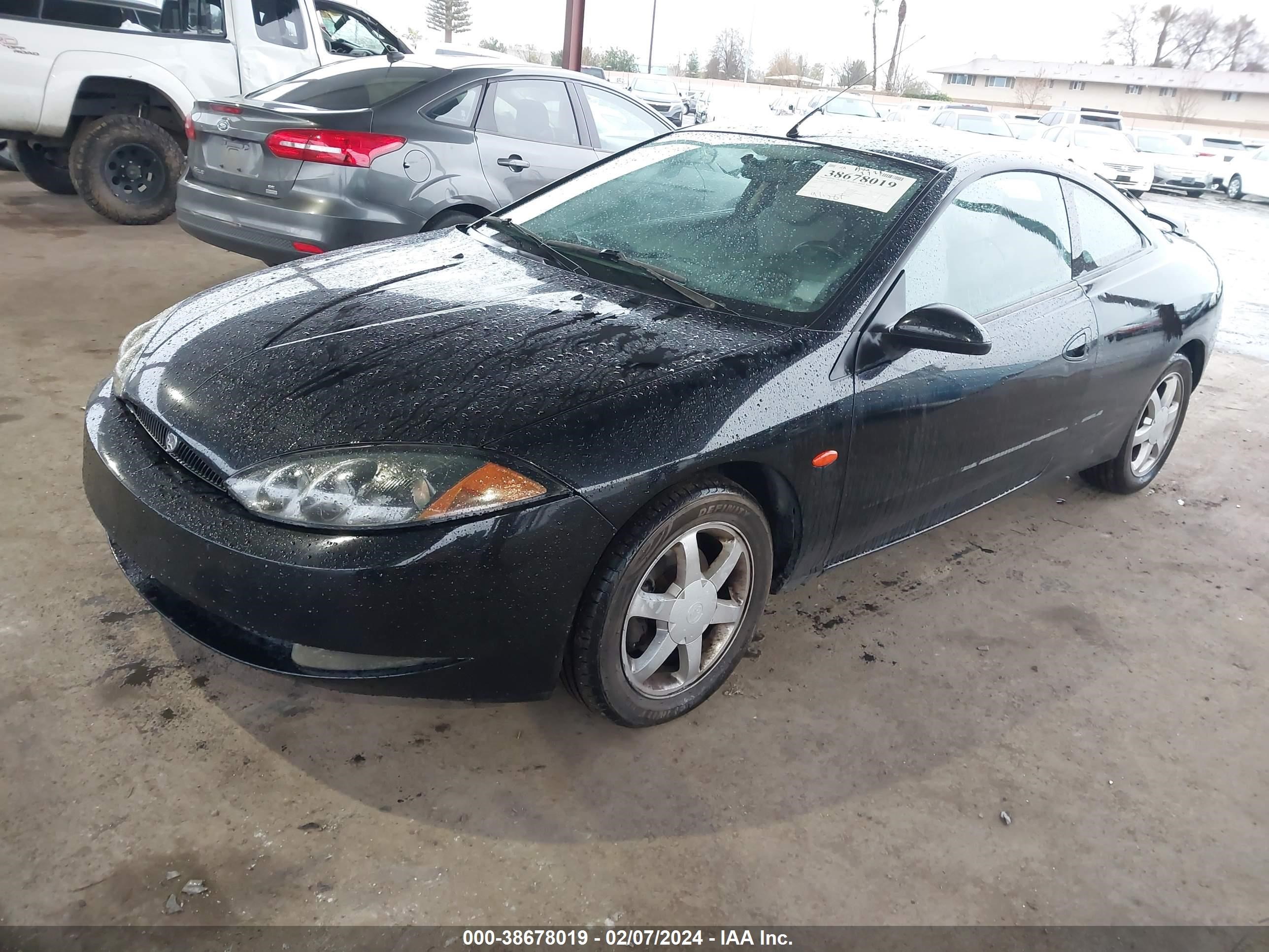 Photo 1 VIN: 1ZWHT61LXY5642710 - MERCURY COUGAR 