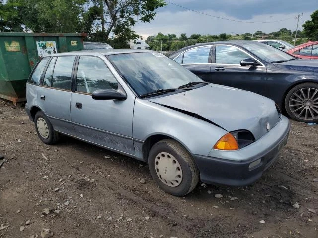 Photo 3 VIN: 2C1MR6469R6726661 - GEO METRO 