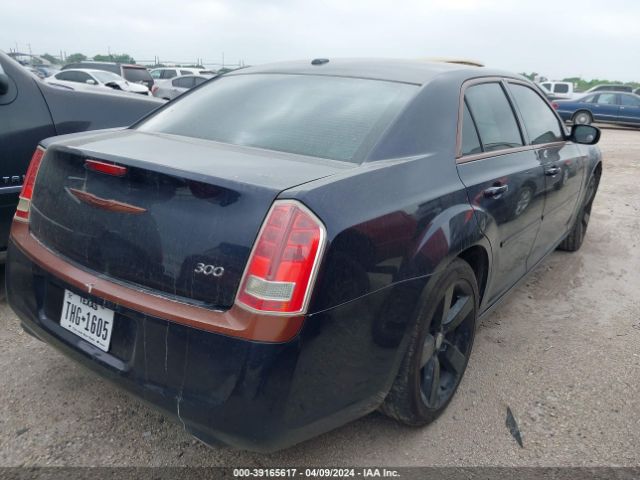 Photo 3 VIN: 2C3CA4CG8BH572723 - CHRYSLER 300 