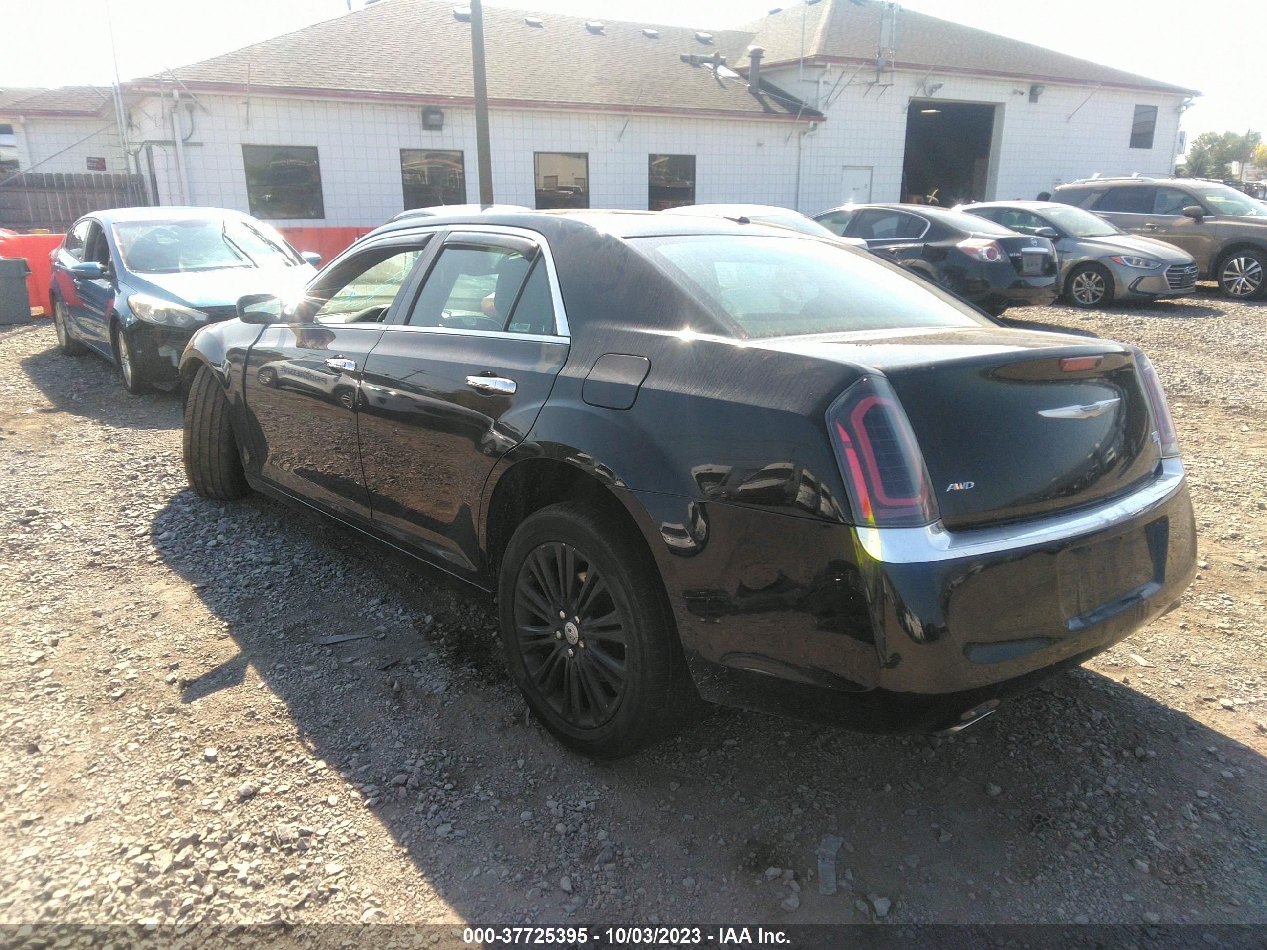 Photo 2 VIN: 2C3CCAKT1EH128580 - CHRYSLER 300 