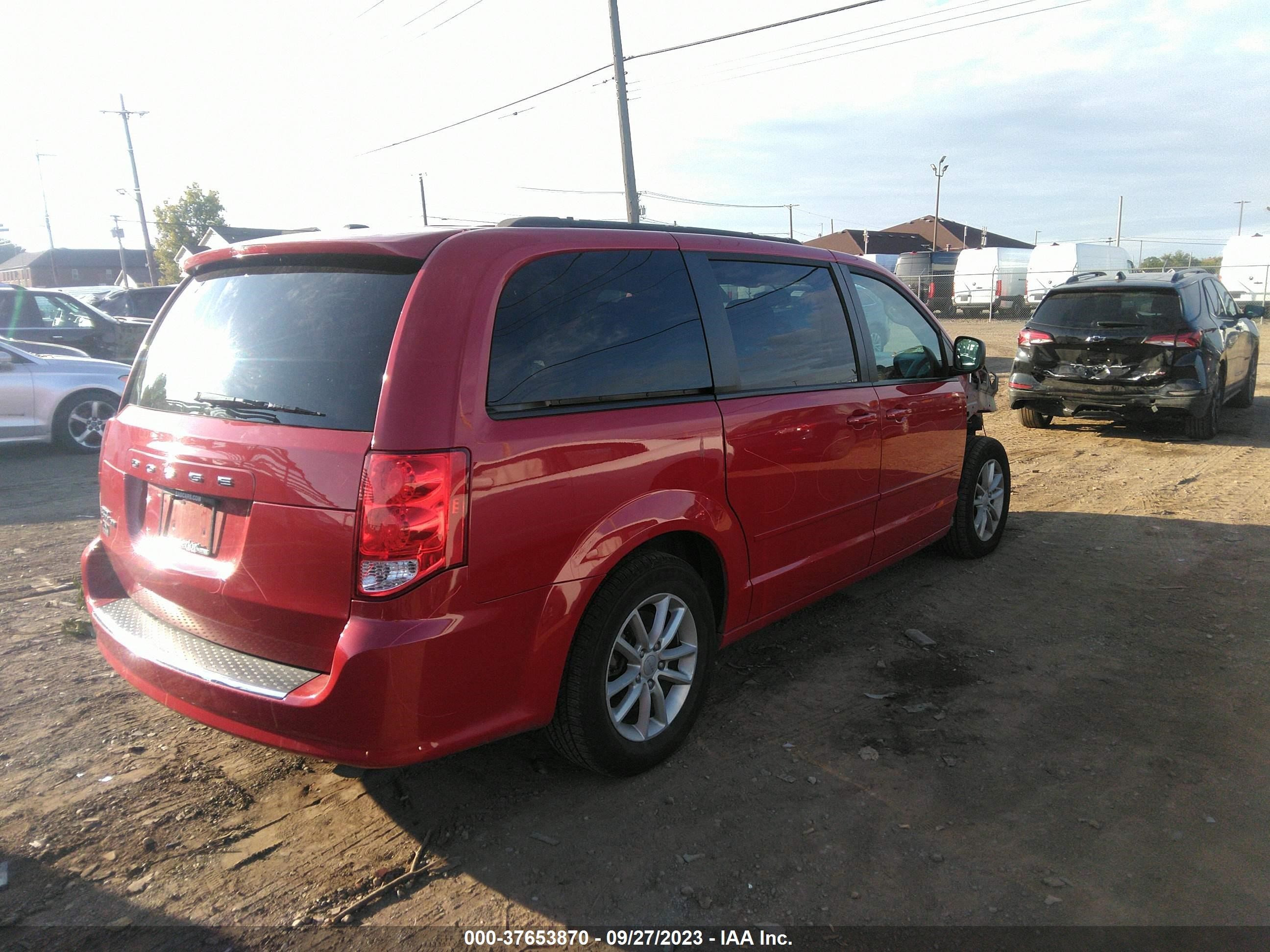 Photo 3 VIN: 2C4RDGBG0DR570493 - DODGE CARAVAN 