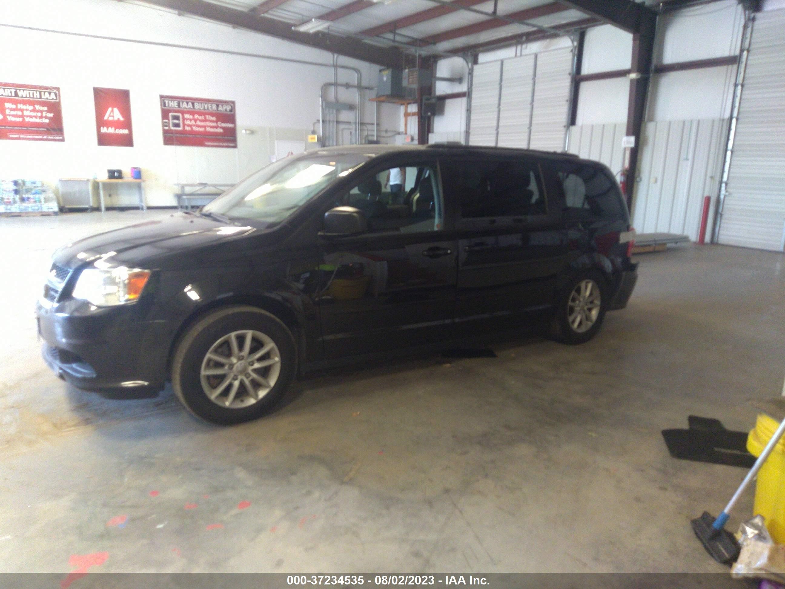 Photo 12 VIN: 2C4RDGBG0GR110285 - DODGE CARAVAN 