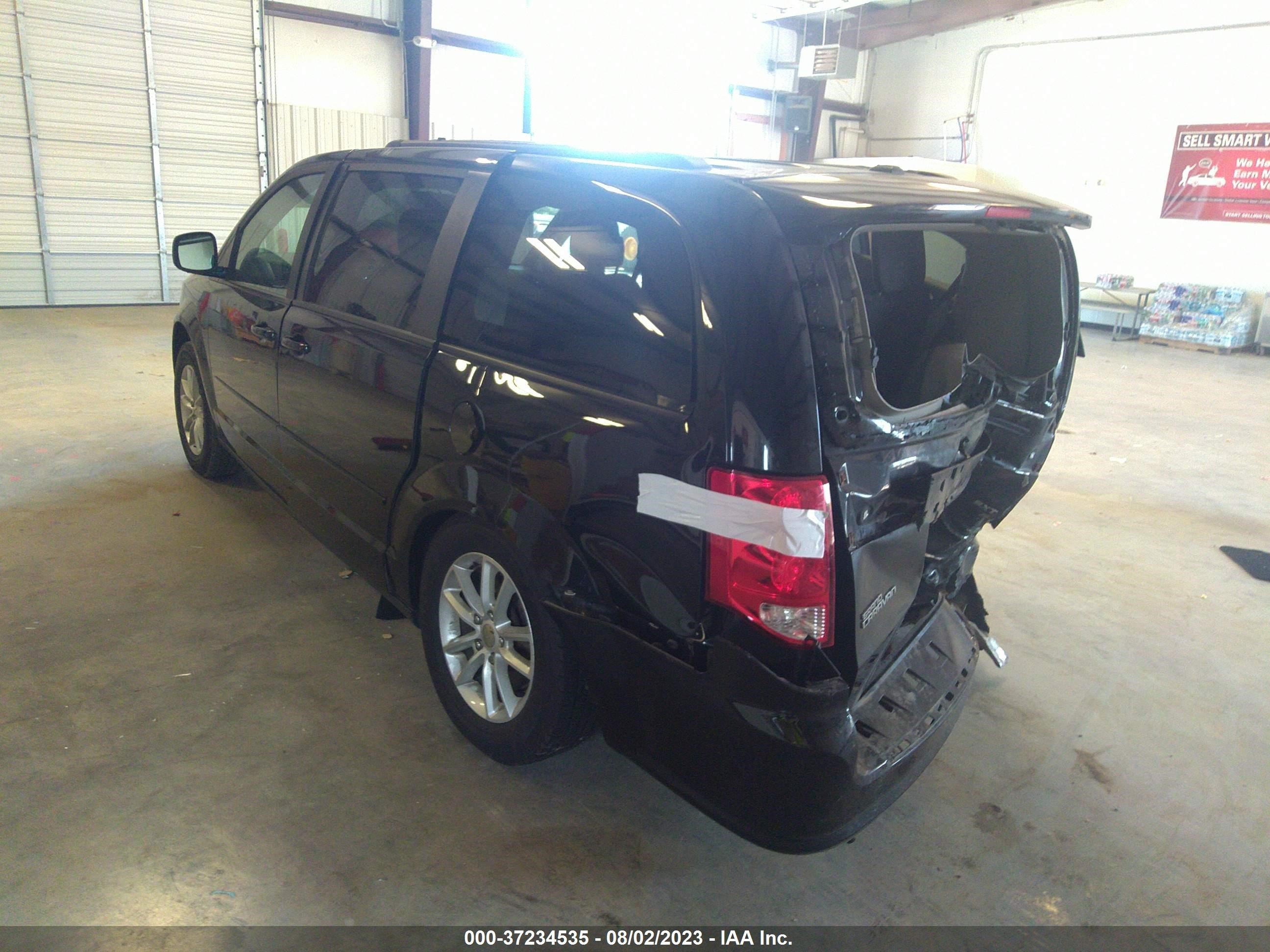 Photo 2 VIN: 2C4RDGBG0GR110285 - DODGE CARAVAN 