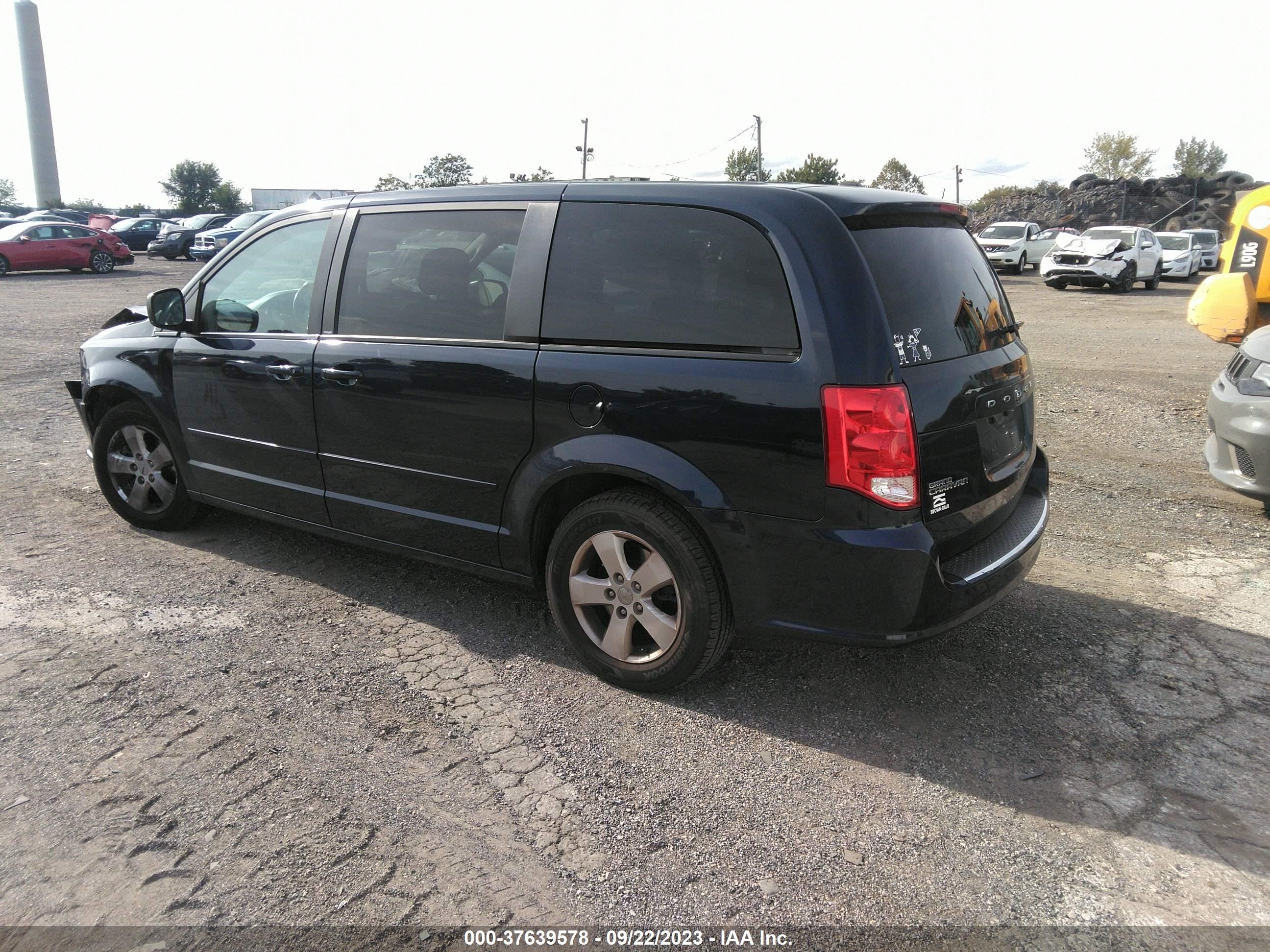 Photo 2 VIN: 2C4RDGBG2DR704291 - DODGE CARAVAN 