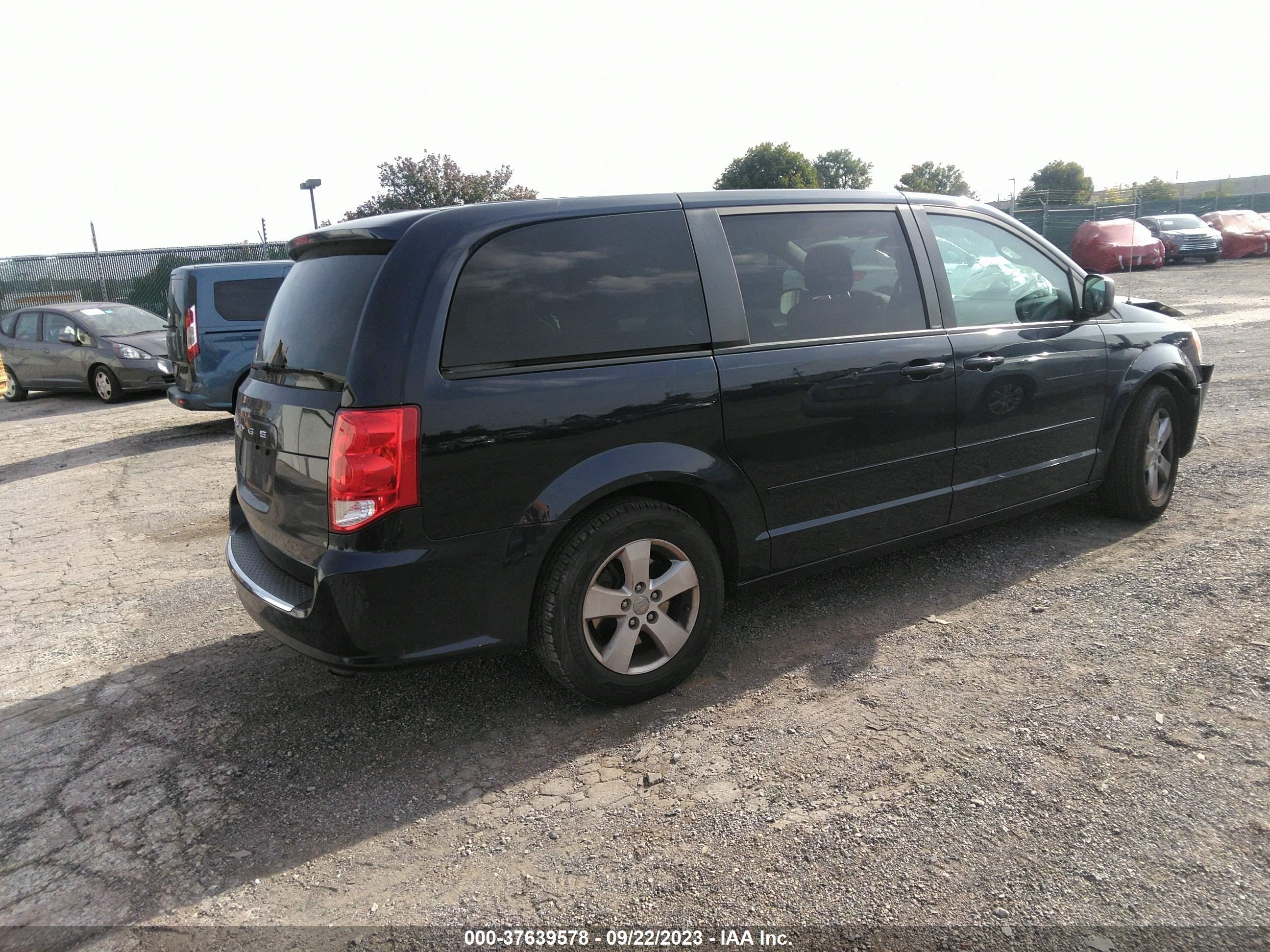 Photo 3 VIN: 2C4RDGBG2DR704291 - DODGE CARAVAN 