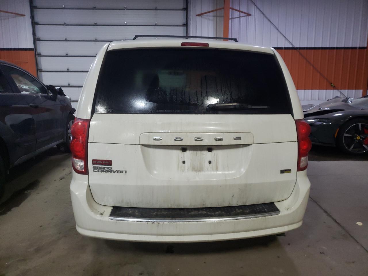 Photo 5 VIN: 2C4RDGBG4DR501371 - DODGE CARAVAN 