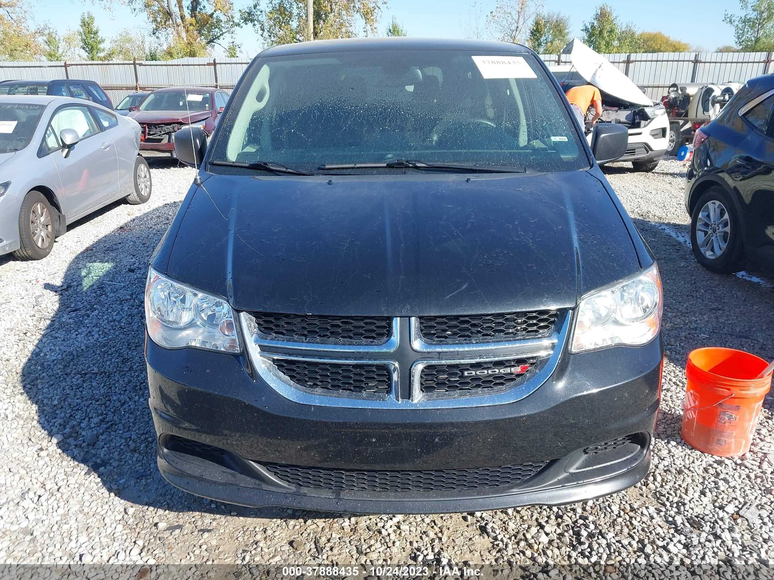 Photo 11 VIN: 2C4RDGBG4KR572325 - DODGE CARAVAN 