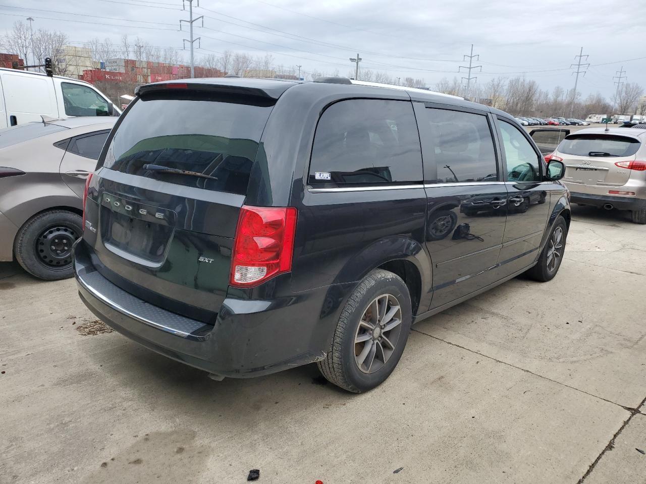 Photo 2 VIN: 2C4RDGCG0HR852380 - DODGE CARAVAN 