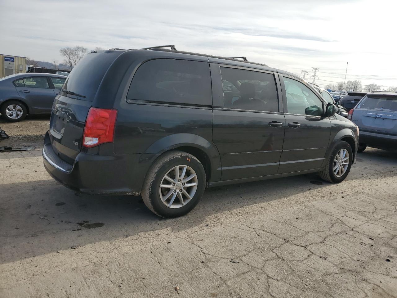 Photo 2 VIN: 2C4RDGCG2DR772301 - DODGE CARAVAN 