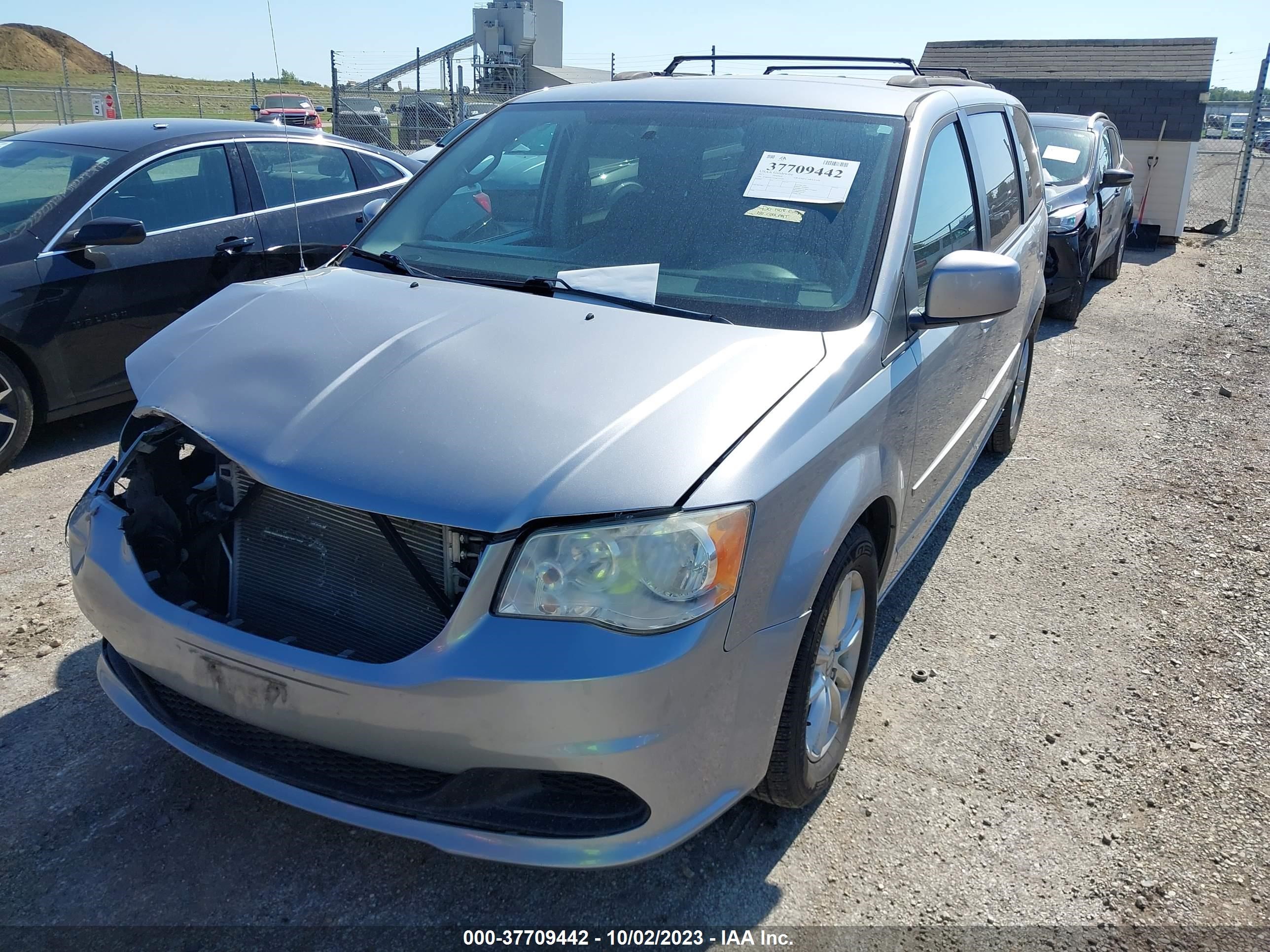 Photo 1 VIN: 2C4RDGCG3DR727044 - DODGE CARAVAN 