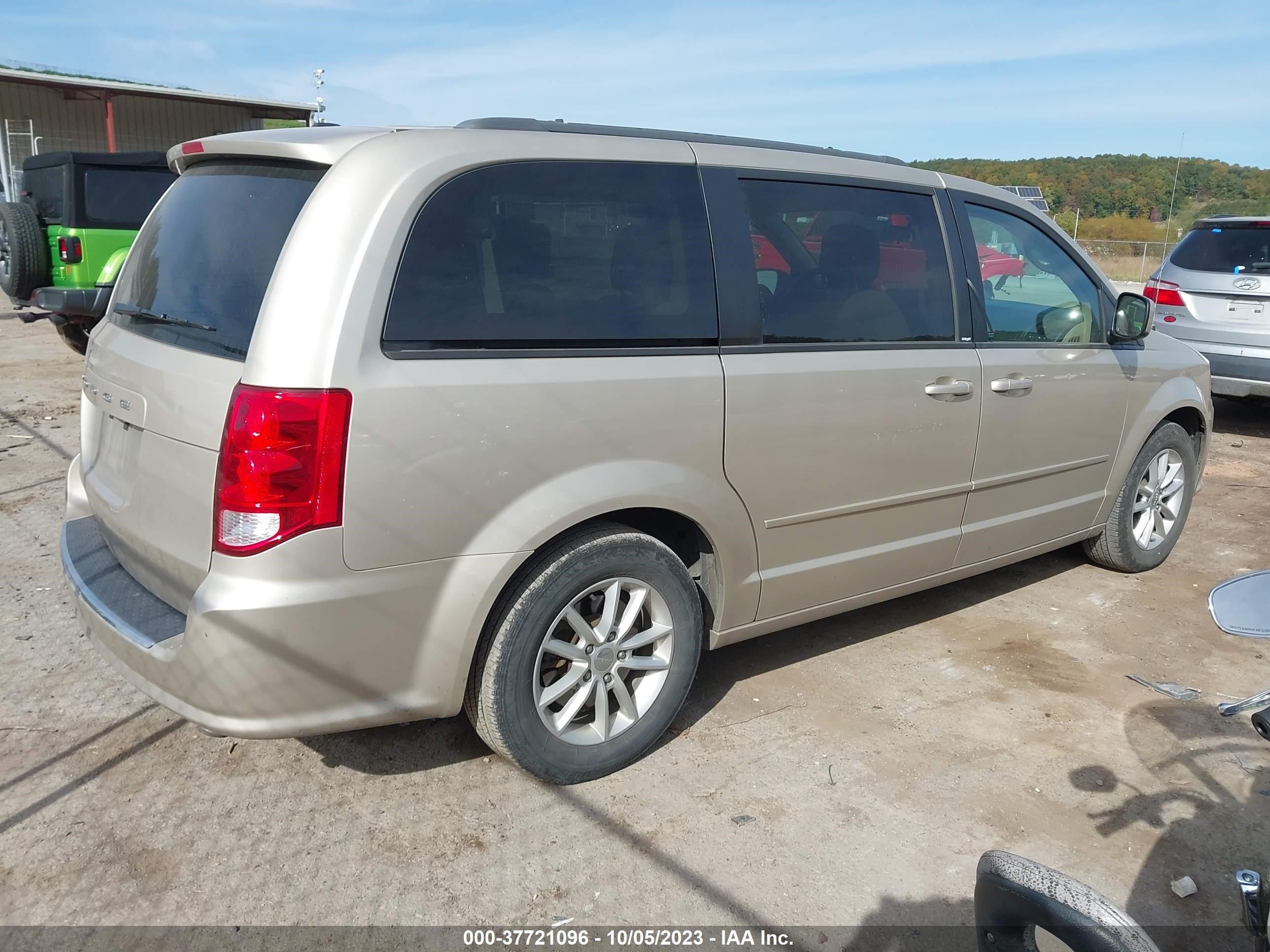 Photo 3 VIN: 2C4RDGCG3DR800915 - DODGE CARAVAN 