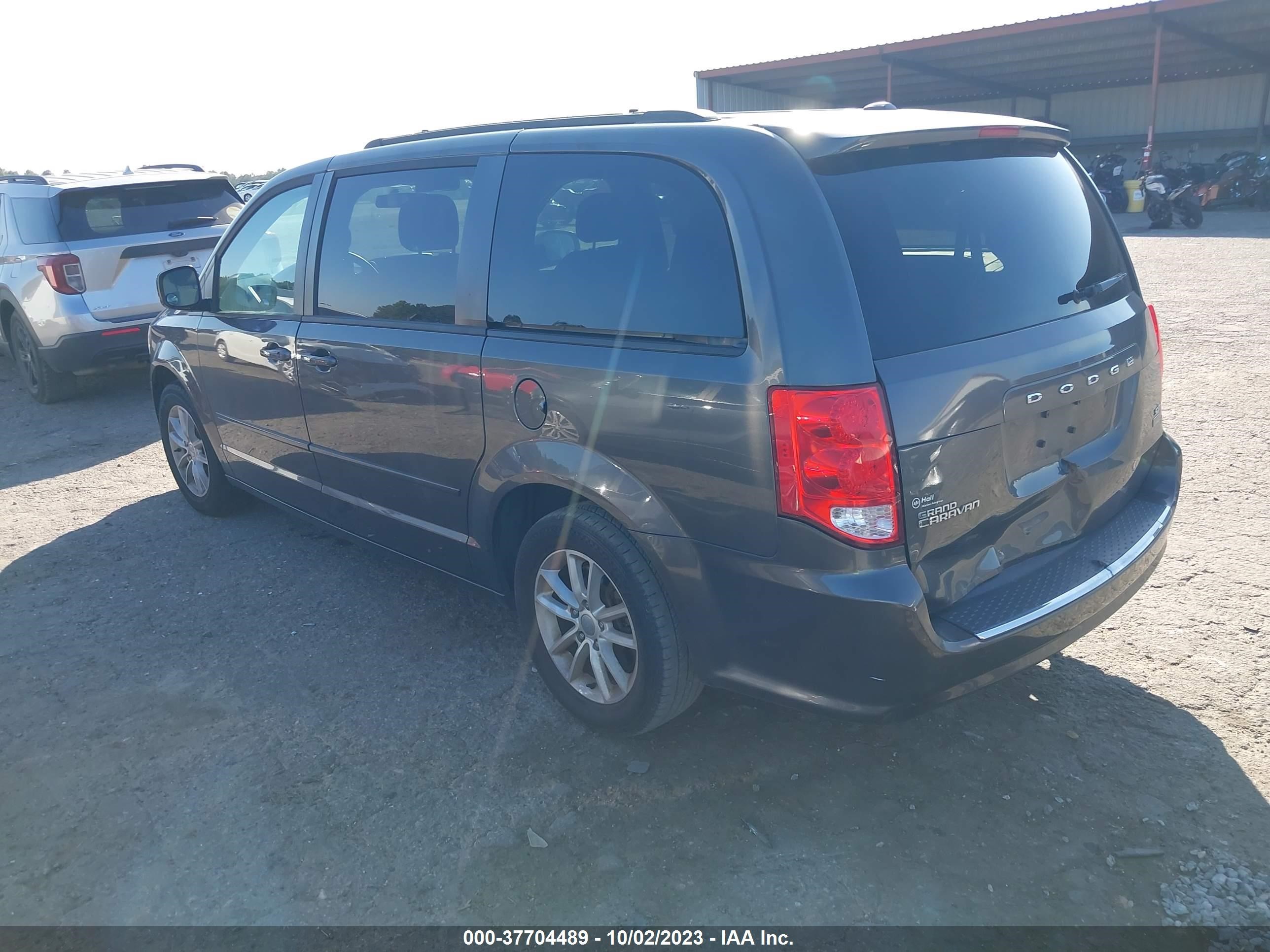 Photo 2 VIN: 2C4RDGCG3GR324217 - DODGE CARAVAN 