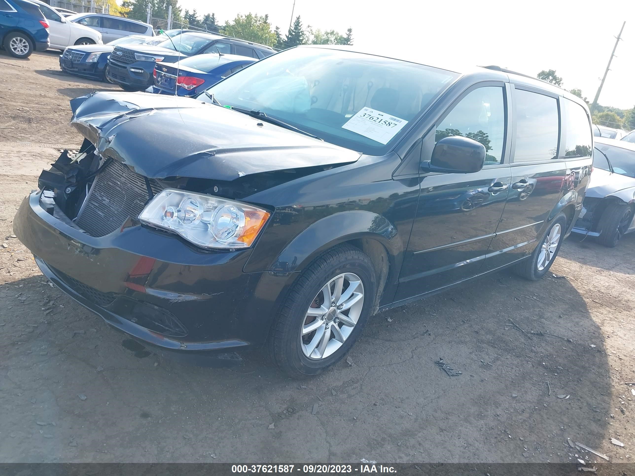 Photo 1 VIN: 2C4RDGCG5DR772180 - DODGE CARAVAN 