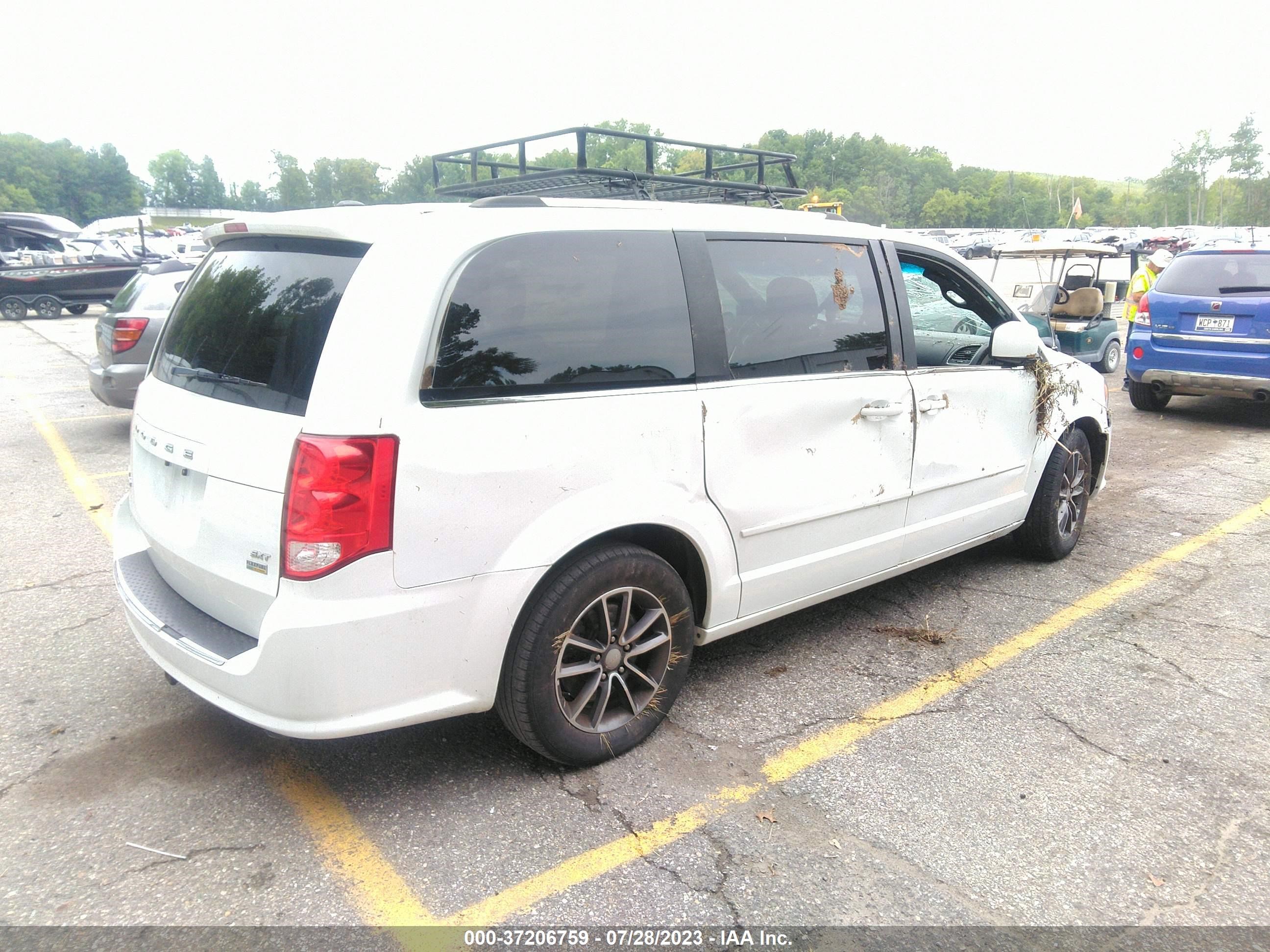 Photo 3 VIN: 2C4RDGCG7HR800101 - DODGE CARAVAN 