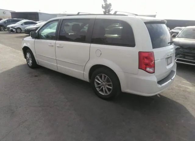 Photo 2 VIN: 2C4RDGCGXDR770649 - DODGE GRAND CARAVAN 