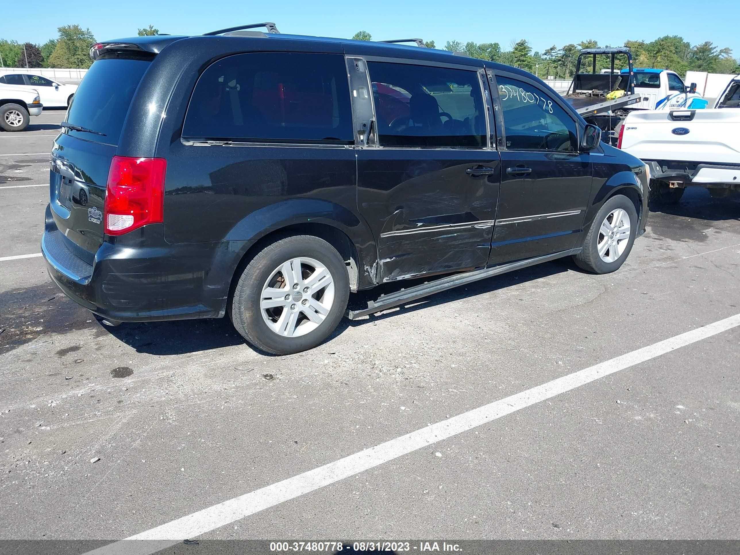 Photo 3 VIN: 2C4RDGDG4DR532715 - DODGE CARAVAN 