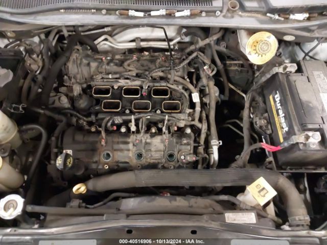 Photo 9 VIN: 2C4RDGEG0KR770024 - DODGE GRAND CARAVAN 