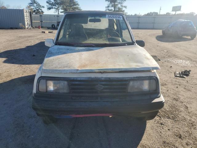 Photo 4 VIN: 2CNBJ18UXL6217744 - GEO TRACKER 