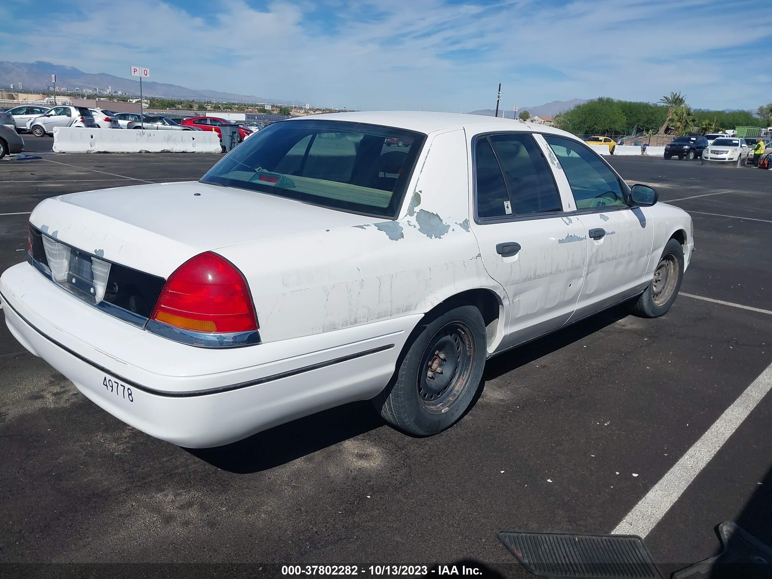 Photo 3 VIN: 2FAFP71W3XX149778 - FORD CROWN VICTORIA 