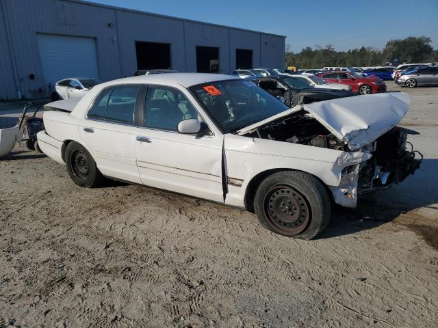 Photo 3 VIN: 2FAFP73W7XX125867 - FORD CROWN VIC 