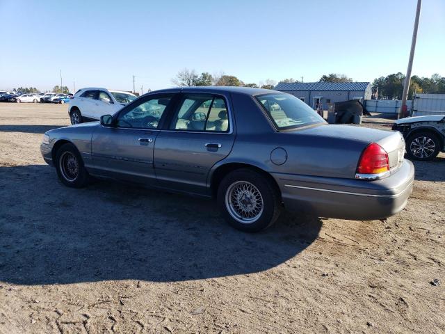 Photo 1 VIN: 2FAFP74W1YX130062 - FORD CROWN VIC 