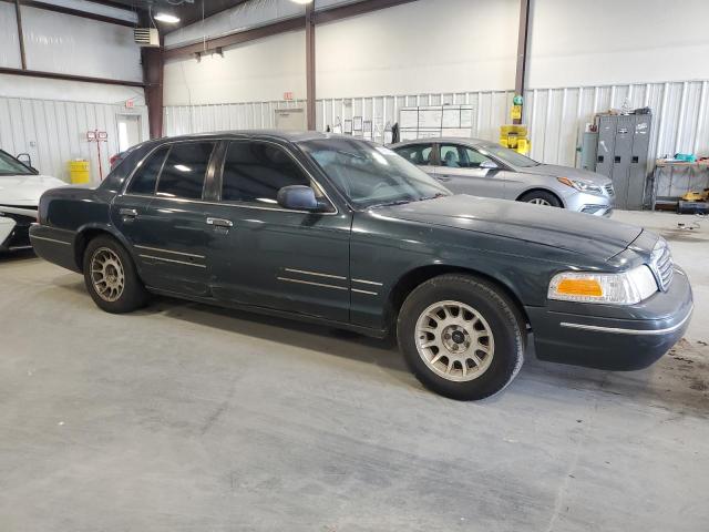 Photo 3 VIN: 2FAFP74W6WX135643 - FORD CROWN VIC 