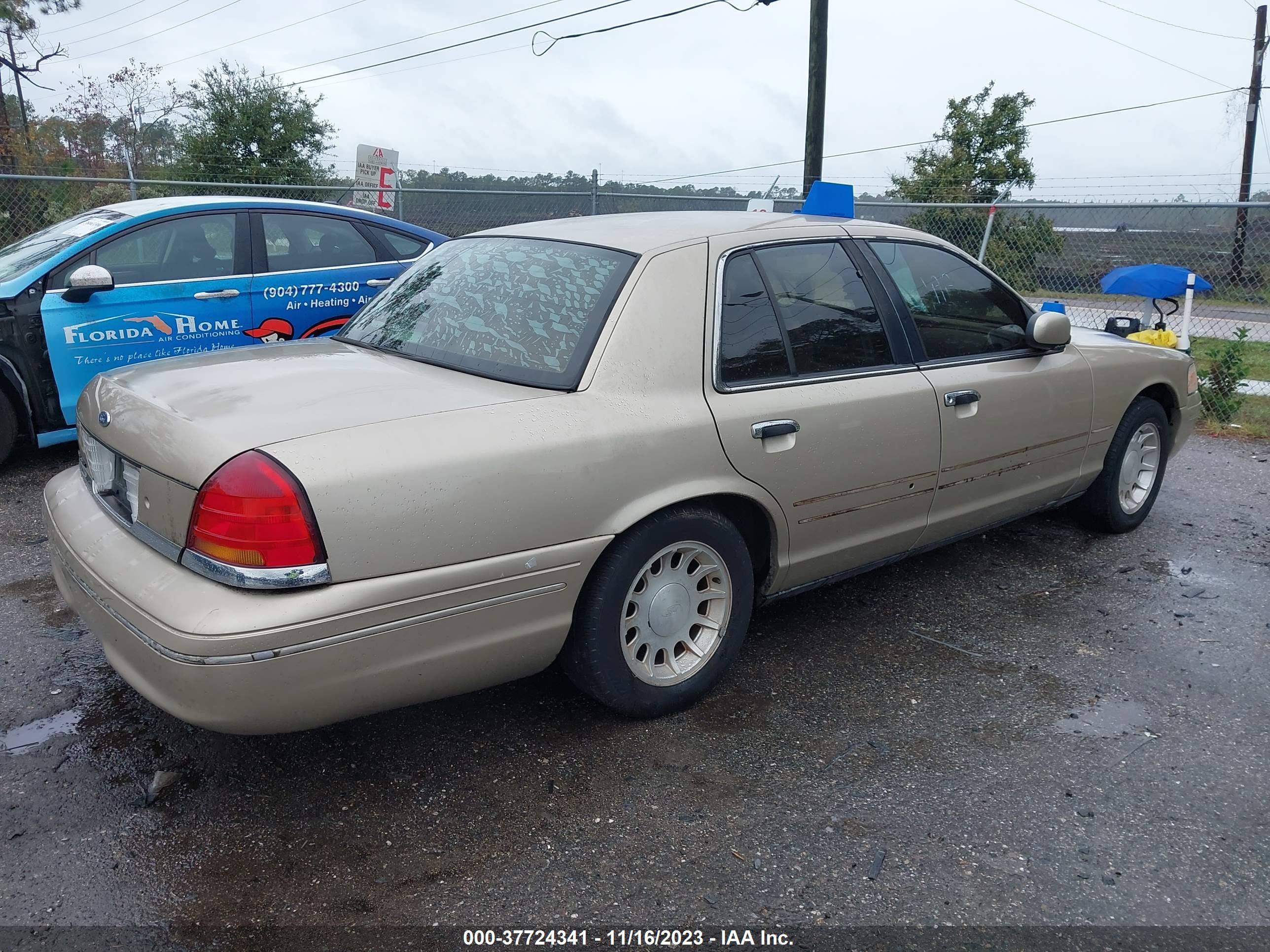 Photo 3 VIN: 2FAFP74W9XX211728 - FORD CROWN VICTORIA 