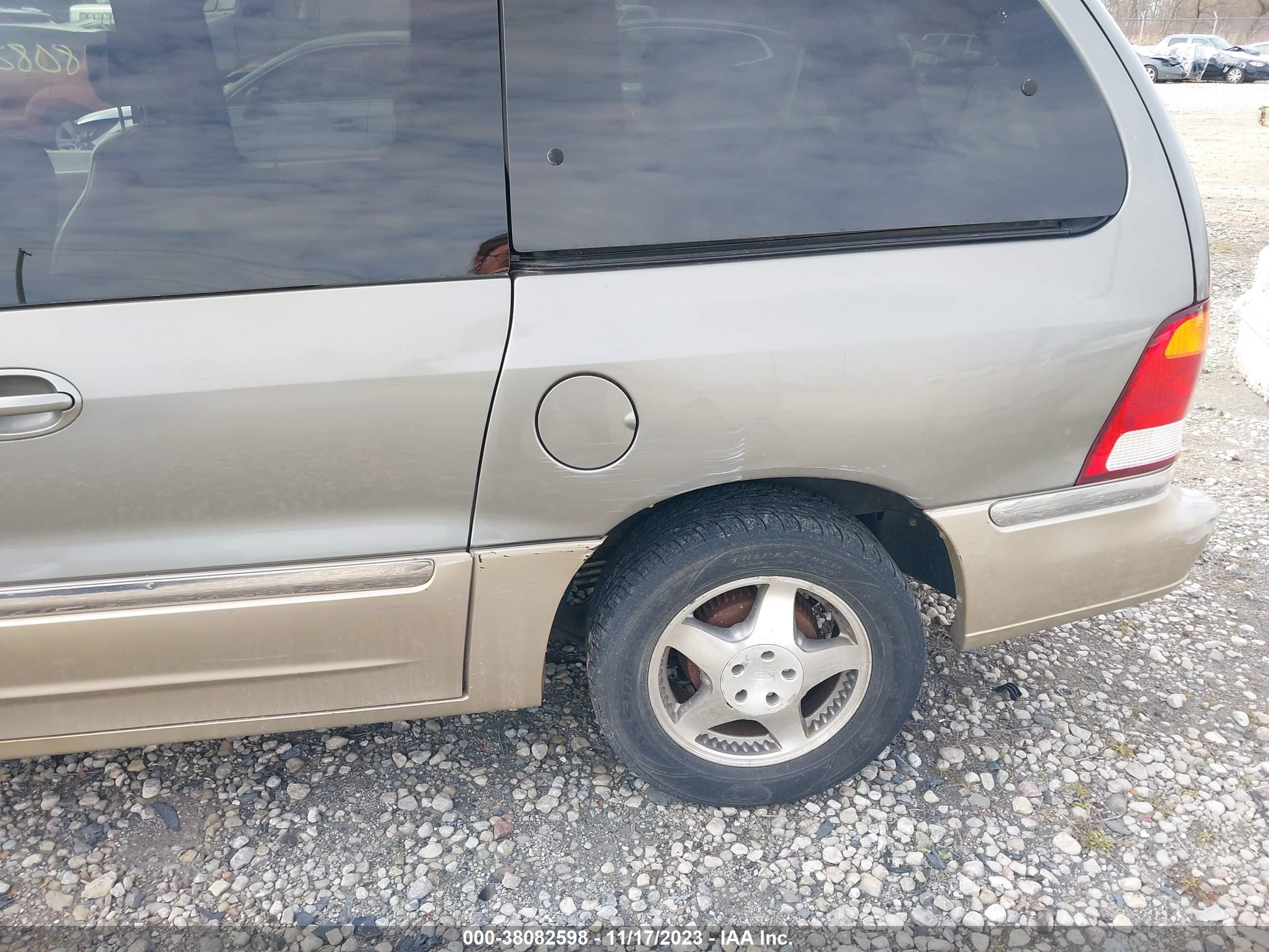 Photo 5 VIN: 2FMDA5342YBA00324 - FORD WINDSTAR 