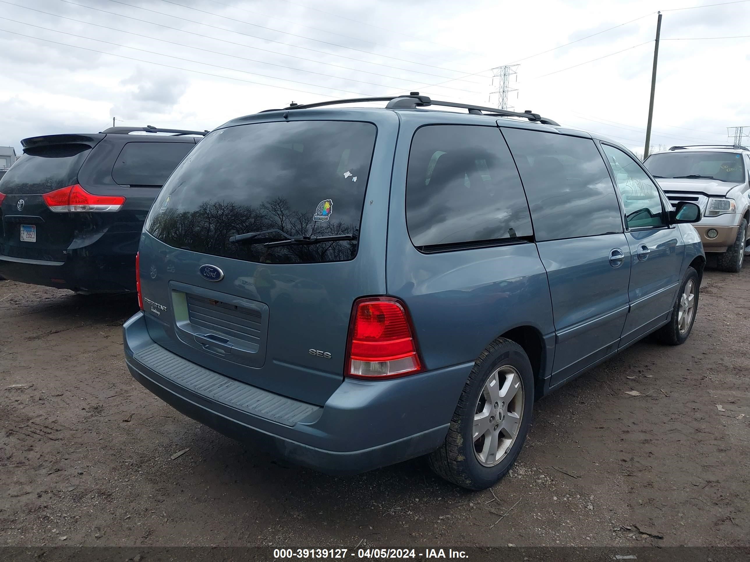 Photo 3 VIN: 2FMDA57684BA78015 - FORD FREESTAR 