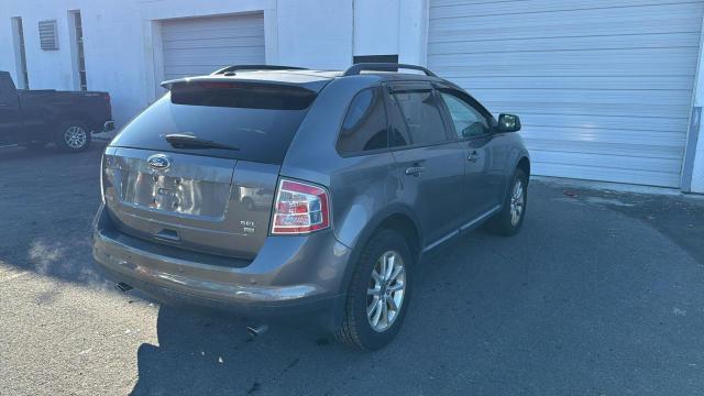 Photo 3 VIN: 2FMDK4JC8ABB39588 - FORD EDGE SEL 