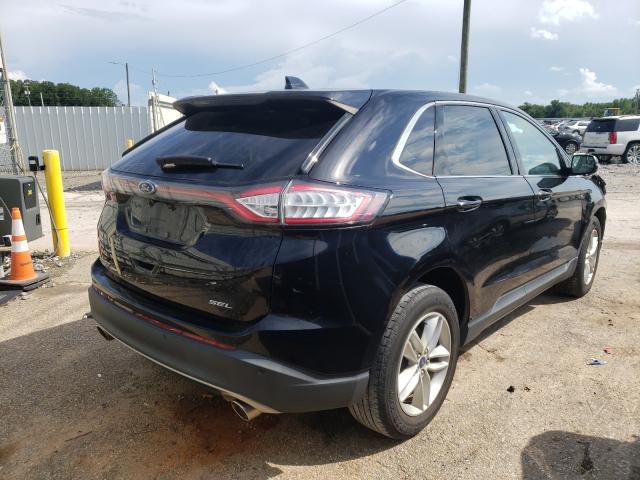 Photo 3 VIN: 2FMPK3J81GBB73657 - FORD EDGE 