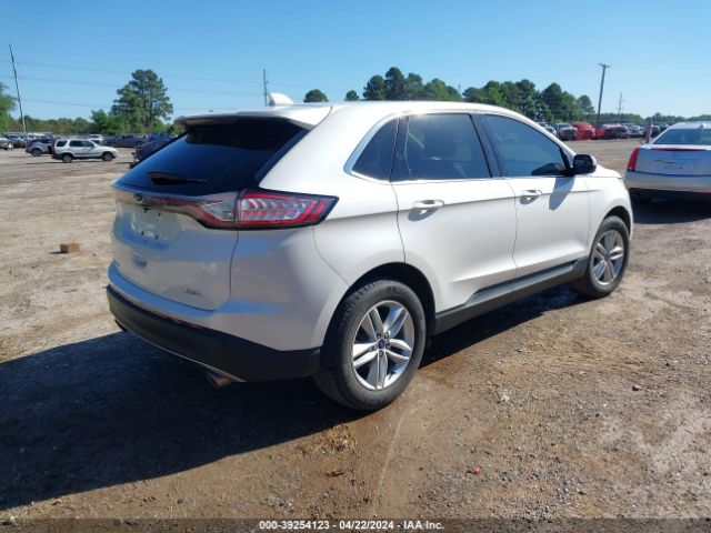 Photo 3 VIN: 2FMPK3J83JBB18988 - FORD EDGE 