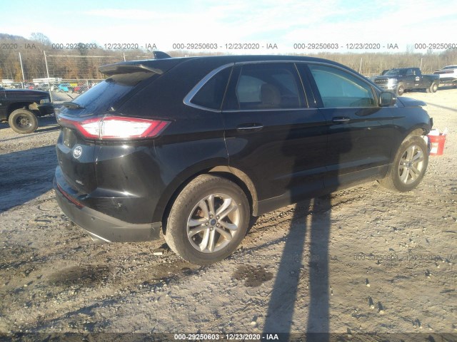 Photo 3 VIN: 2FMPK3J88GBC04161 - FORD EDGE 