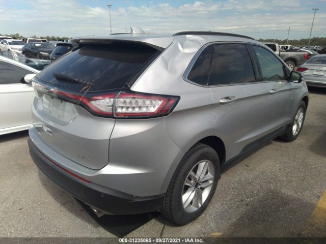 Photo 3 VIN: 2FMPK3J88GBC34180 - FORD EDGE 