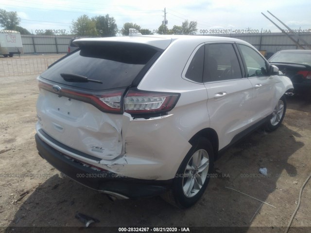 Photo 3 VIN: 2FMPK3J90GBC66131 - FORD EDGE 