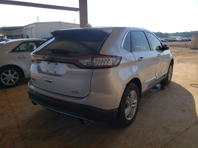 Photo 3 VIN: 2FMPK3J91GBB27948 - FORD EDGE 