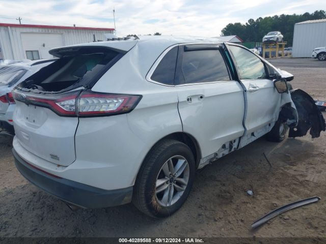 Photo 3 VIN: 2FMPK3J92JBB75871 - FORD EDGE 