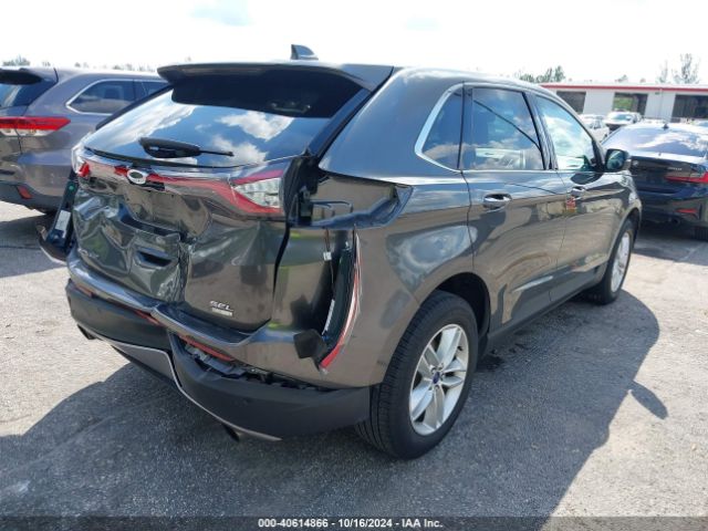 Photo 3 VIN: 2FMPK3J93GBB70879 - FORD EDGE 