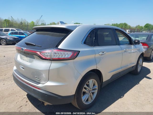 Photo 3 VIN: 2FMPK3J93GBC21670 - FORD EDGE 