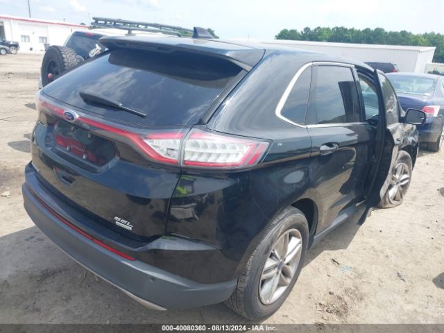 Photo 3 VIN: 2FMPK3J94GBC56637 - FORD EDGE 