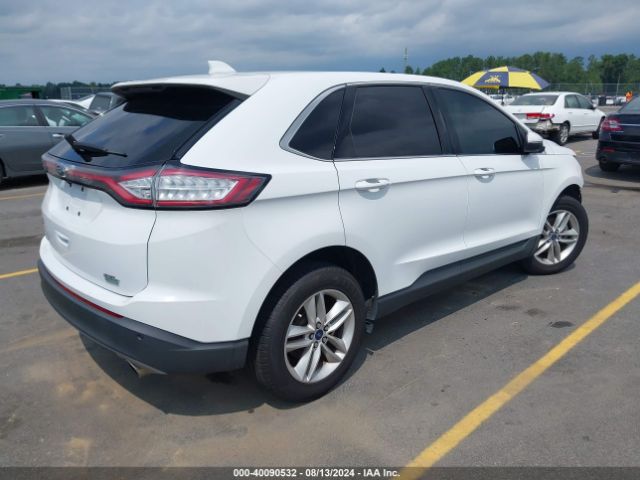 Photo 3 VIN: 2FMPK3J97GBB27775 - FORD EDGE 